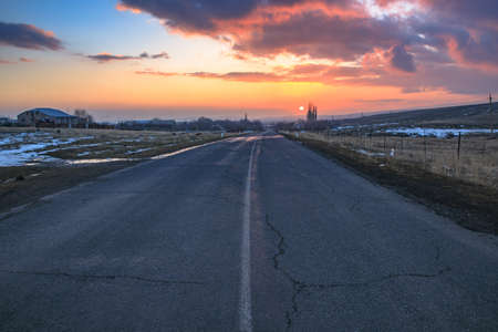 beautiful and colorful sunset with road