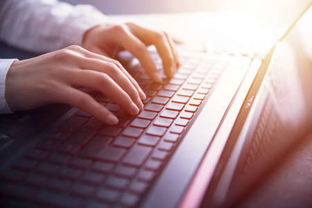 young woman hand computer keyboardの写真素材