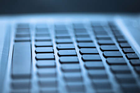 Closeup image of modern laptop computer keyboard