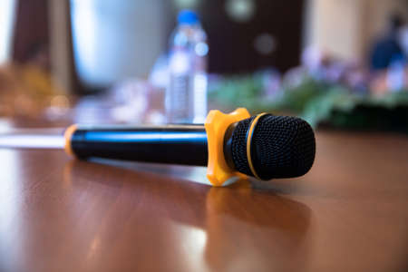 conference hall with microphone on deskの写真素材
