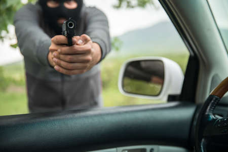 man with a gun threatened driver in nature