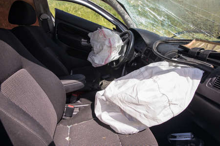 Airbag exploded at a car accident backgroundの写真素材