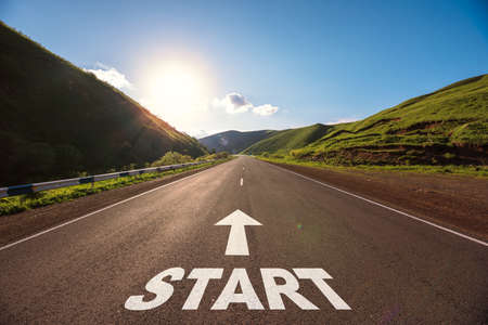 start text on road under skyの写真素材
