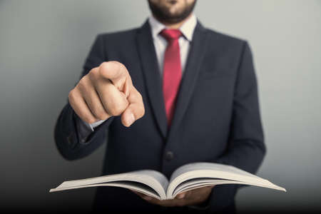 man hand holding book with you signの写真素材