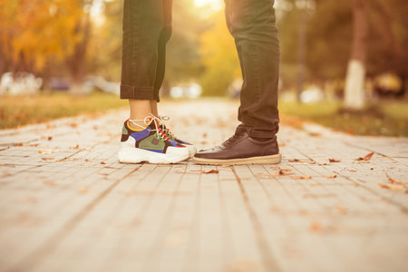 couple feet in the nature at the sunsetの写真素材