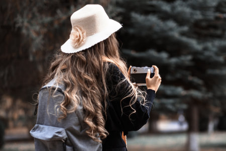 woman hand photo camera in natureの写真素材