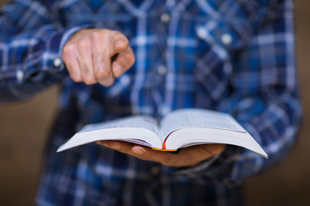 man hand Bible with you sign