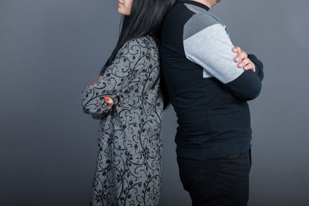 sad woman and man back in back