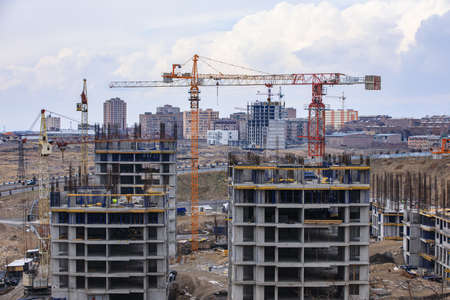 Aerial view on the building with construction cranesの写真素材