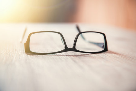 Eye glasses on the white tableの写真素材