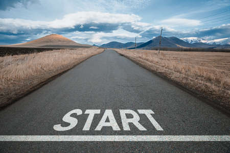 start on road with mountain under skyの写真素材
