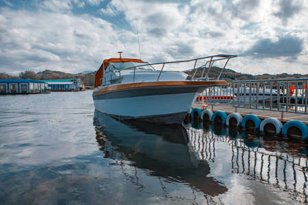 ship in port and restaurant on the waterの写真素材