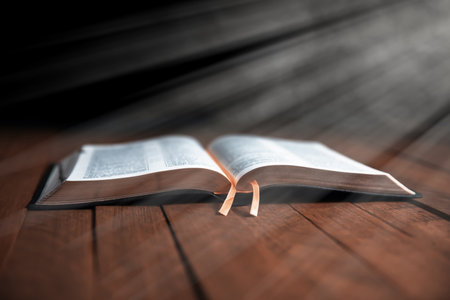 Open Bible on the wooden tableの写真素材