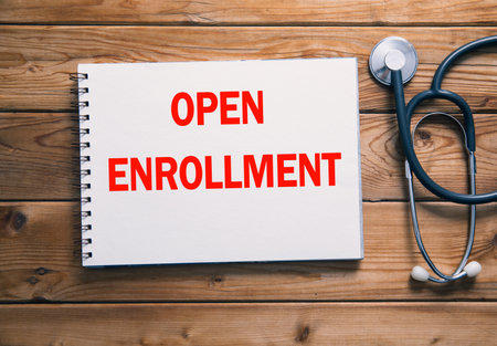 open enrollment on paper and stethoscopeの写真素材