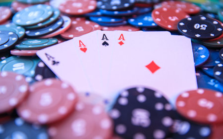 Pair of aces with poker chips on the poker tableの写真素材