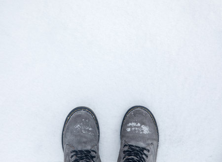 winter shoes on snow in winter timeの写真素材