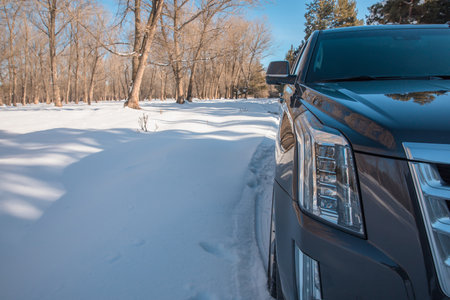 car on winter road in the morning