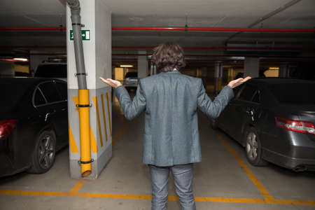 young man's car was stolen, can't find car at underground parking