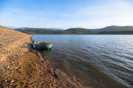 old boat in lake beachの写真素材