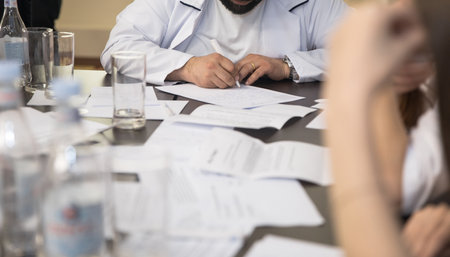 doctors hands papers, insurance in health care
