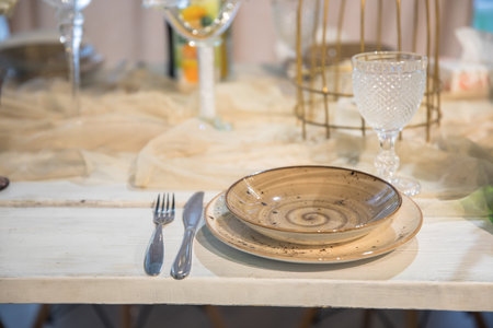 Decoration of the centerpieces of a wedding with the cutlery and vintage details