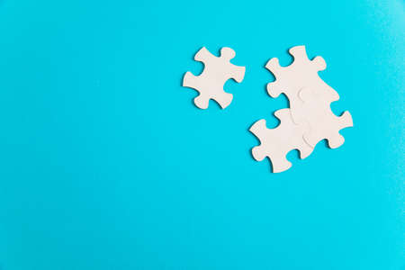Team concept, Puzzle pieces on blue background.の写真素材