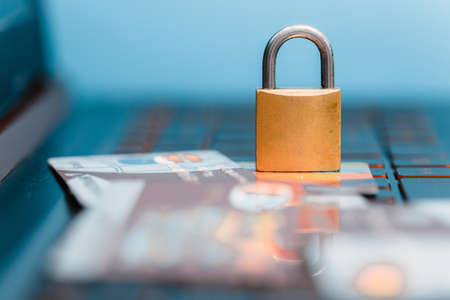 lock and credit card on keyboard backgroundの写真素材