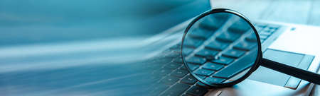 magnifier with notebook, search conceptの写真素材