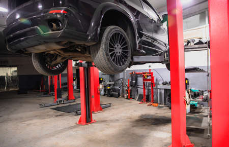The electric lift for cars in the service centerの写真素材