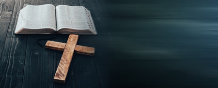 Holy Bible with wooden cross on the tableの写真素材