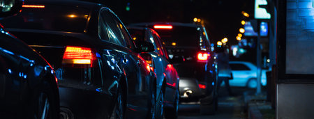 Cars are stuck in traffic at nightの写真素材