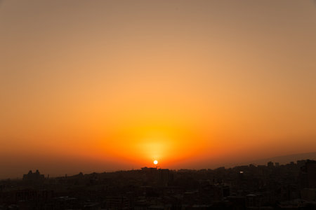 Colorful sunset in the cityの写真素材