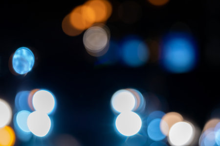 Bokeh in the night city as backgroundの写真素材