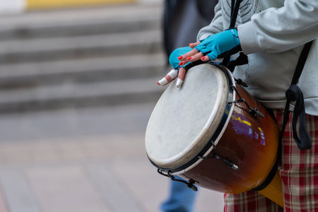 Street musician playing the drum on the streetの写真素材