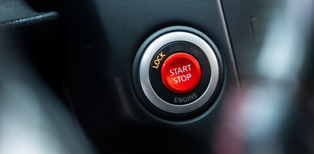 Red start stop button in the car