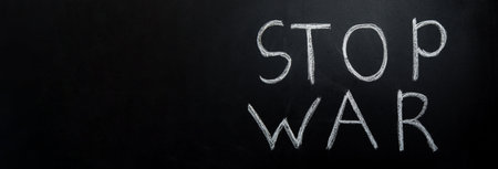 stop war text on the blackboardの写真素材