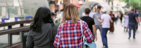 people walking in the city street