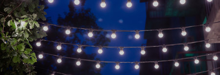 light bulbs in night street background