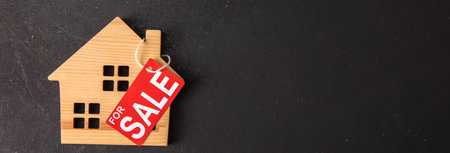 concept of selling home on wooden background