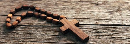 Wooden cross on the table. religious symbolsの写真素材