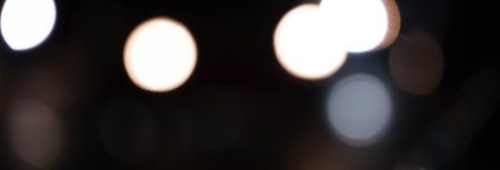 White bokeh on black backgroundの写真素材