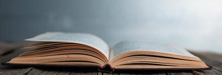 open book on the wooden tableの写真素材