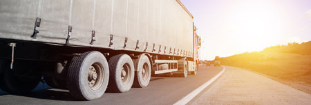 truck on road in sunsetの写真素材