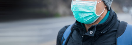 man face mask in streetの写真素材