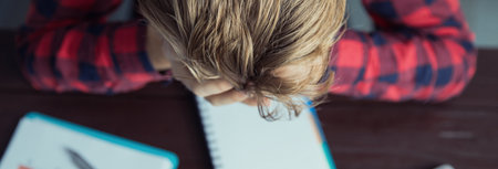 sad man working in computer in working deskの写真素材