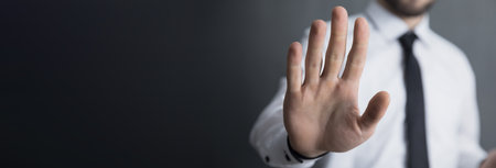 business man hand stop signの写真素材