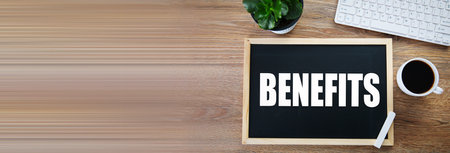 benefits text on board with keyboard
