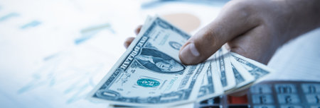 man hand money with document on desk