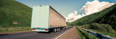 truck on road under blue skyの写真素材
