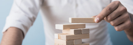 Board game tower of light wood sticksの写真素材